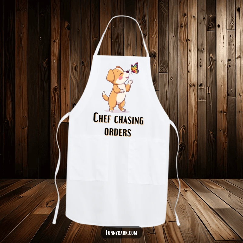 Funny kitchen apron featuring a dog character on hind legs, barking at a butterfly, perfect for playful home cooks.