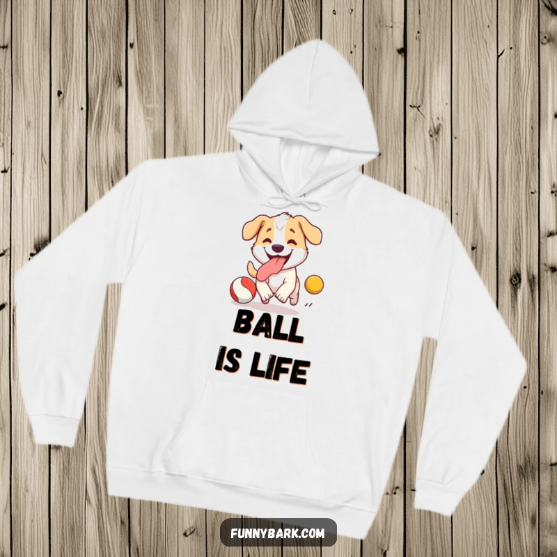 Funny Dog Hoodie: A happy, tongue-lolling dog in full pursuit of a bouncing ball, showcasing pure excitement and fun.
