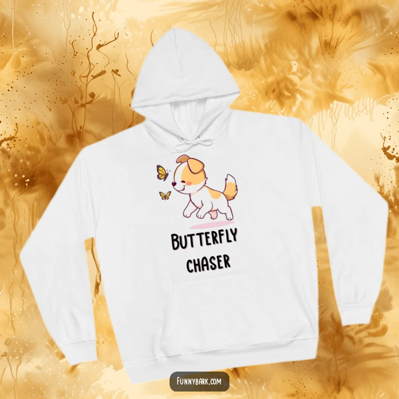 Funny Dog Hoodie: A dog with its tail wagging furiously, excitedly chasing a fluttering butterfly, embodying pure joy.